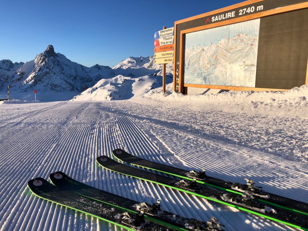 Piste skis ready to be used at the top of meribel and courchevel's best ski run